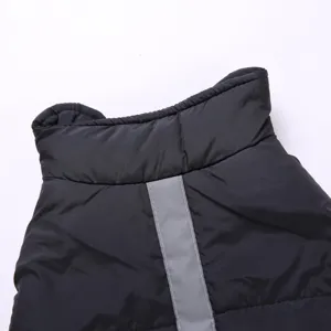 Close-up detail of pet winter jacket collar and reflective strip for small dogs warmth.