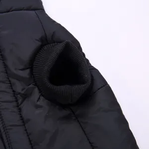 Detailed view of black pet winter vest for small dogs, warm quilted fabric and rib cuffs.
