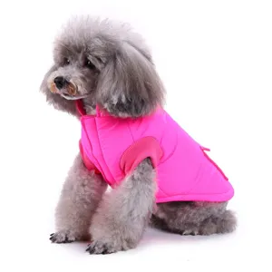 Warm winter pet dog jacket in bright pink, cozy apparel for small dogs like poodles and pomeranians.