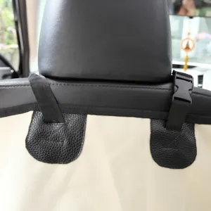 Pet car seat cover detail showing durable strap, secure plastic buckle and fine stitching.