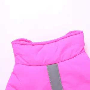 Close-up detail shot of the pink pet winter jacket collar and reflective safety strip.