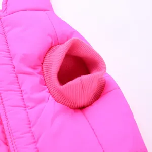 Close-up of pink pet winter jacket sleeve detail, warm fleece lining and ribbed elastic cuffs.
