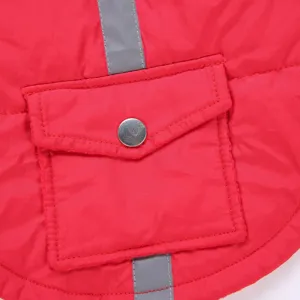 Pet winter warm jacket detail shot, red coat with pocket and reflective strips.