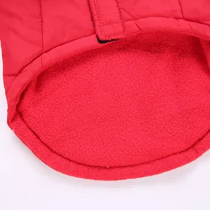 Red pet winter warm cotton coat detail shot, fleece-lined small dog jacket, cold weather apparel.