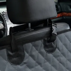 Waterproof pet car seat cover detail showing secure straps, buckles, and quilted fabric.