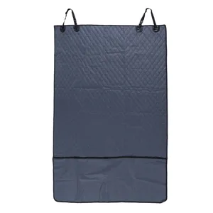Waterproof quilted pet car seat mat detail showing grey fabric texture and hanging straps.