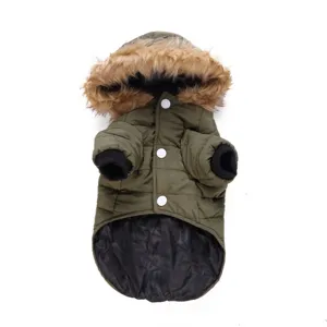 Detailed view of the green pet winter coat with faux fur hood, quilted warm design.