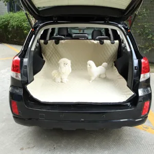 Waterproof dog car trunk mat detail, beige quilted pet car seat cover for SUV and vehicle rear.