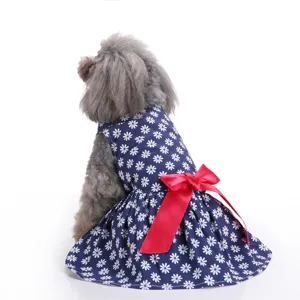 Cute navy blue daisy print dog dress with a large red satin bow for small pets