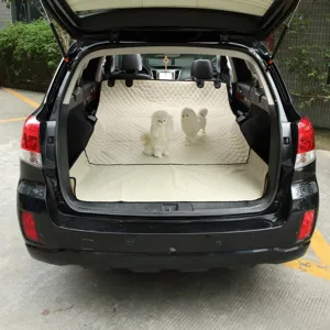 Waterproof car trunk pet mat, durable beige quilted dog cargo liner for SUV boot protection.