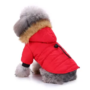 Warm winter dog coat with faux fur hood for small and medium pets like poodles or pomeranians.
