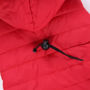 Close-up detail view of a red pet winter jacket hoodie featuring adjustable black drawstring.