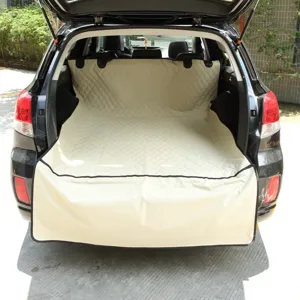 Waterproof dog car trunk mat, quilted beige pet cargo liner for suv vehicle protection.