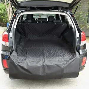 Waterproof car trunk pet mat for dogs, durable black quilted cargo liner for vehicle back.