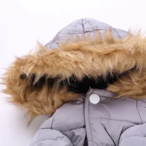 Detailed view of the warm grey pet winter coat with cozy faux fur hood and snap button.