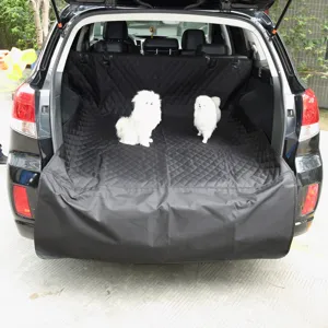 Waterproof car trunk mat for dogs, black quilted pet cargo liner with bumper flap protection.