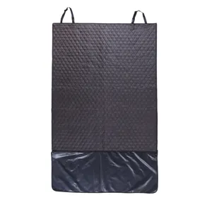 Detailed view of the black quilted pet car mat with waterproof bottom layer and straps.