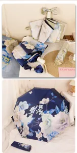 Floral printed triple folding sun and rain umbrella with black glue UV protection shade.