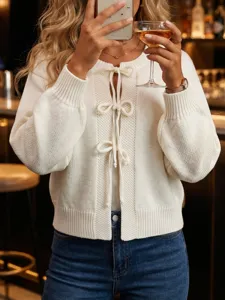 Women's white knit cardigan with bow tie front, long sleeve casual sweater for daily wear.