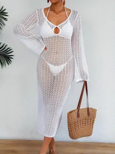 Elegant white sheer crochet mesh beach cover-up maxi dress featuring hollow-out V-neck detail