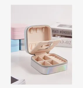 Detailed interior view of a holographic jewelry box with mirror and ring slots