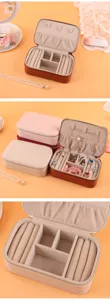 Interior detail of portable PU leather jewelry box showing ring slots and necklace hooks