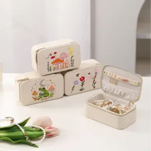 Elegant embroidered cotton linen jewelry box with floral frog and mushroom storage compartments