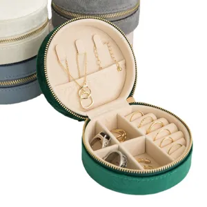 Boîte à bijoux ronde en velours portable pour ranger bagues boucles et colliers