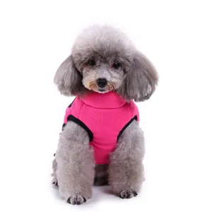 Close-up detail of warm pink fleece pet vest for small dogs, soft texture and comfortable fit.