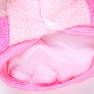 Detail view of winter pet jacket inner lining and soft fleece fabric for small dogs.