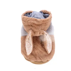 Pet winter fluffy warm fleece coat detail view with cute rabbit ears and polka dot lining.