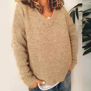 Casual V-neck knit sweater for women, solid color loose long sleeve pullover top for autumn.