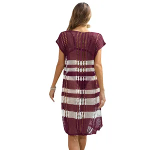 Back view of a women's striped burgundy and white crochet beach bikini cover-up