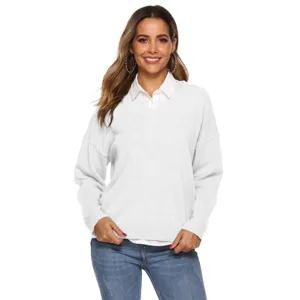 Close up view of white v neck knit sweater with classic shirt collar for women outfit details