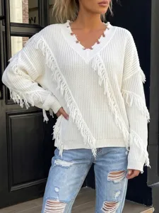 White V-neck knitted sweater featuring stylish irregular fringe and loose long sleeves.