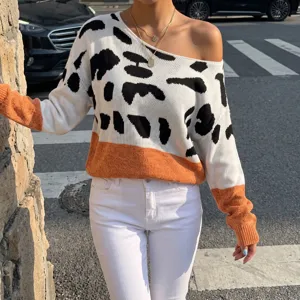 Elegante maglione in maglia leopardata da donna con scollo a barca e dettagli color block