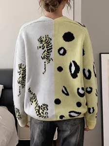 Colorblock knit cardigan featuring tiger and leopard jacquard patterns for a cozy look.
