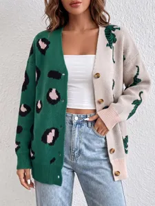 Colorblock leopard print knit cardigan detail, soft cozy button front sweater texture shot.