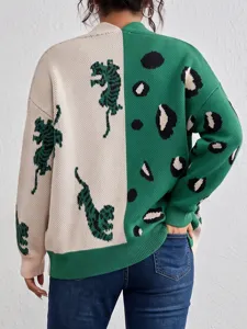 Detailed view of the colorblock knit cardigan featuring tiger and leopard jacquard patterns.