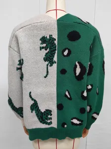 Colorblocked knit cardigan featuring tiger and leopard jacquard patterns for women.