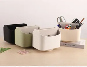 Group display of rotating desktop organizers in black, green, and cream white colors