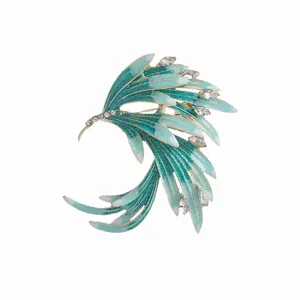 Detailed view of the elegant blue-green gradient feather brooch with rhinestones