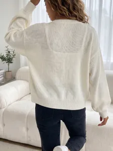 Maglione in maglia a maniche lunghe ampio e casual da donna, stile quotidiano autunnale.