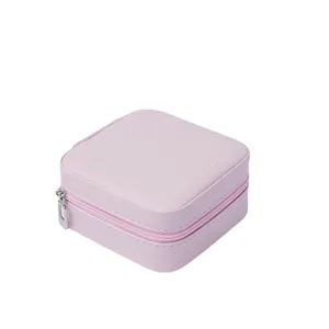 Piccola scatola portagioie in pelle rosa chiaro per anelli e orecchini con cerniera da viaggio