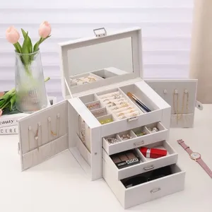 Grande boîte à bijoux blanche avec miroir et plusieurs compartiments de tiroirs