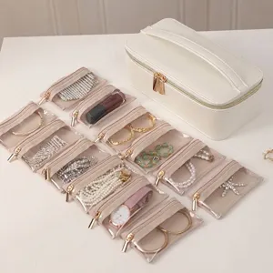 Portable 12-piece cream white jewelry organizer bag set with clear travel storage pouches