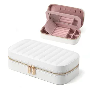 Portable white striped jewelry storage box with mirror and gold metal zipper detail.