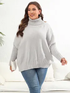 Detail view of the cozy grey knit turtleneck sweater showcasing the soft texture and relaxed fit.