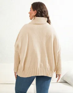 Back detail view of women beige oversized turtleneck sweater, cozy knitwear fashion style.