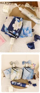 Three-fold floral print sun umbrella with bow, UV protection black glue umbrella.